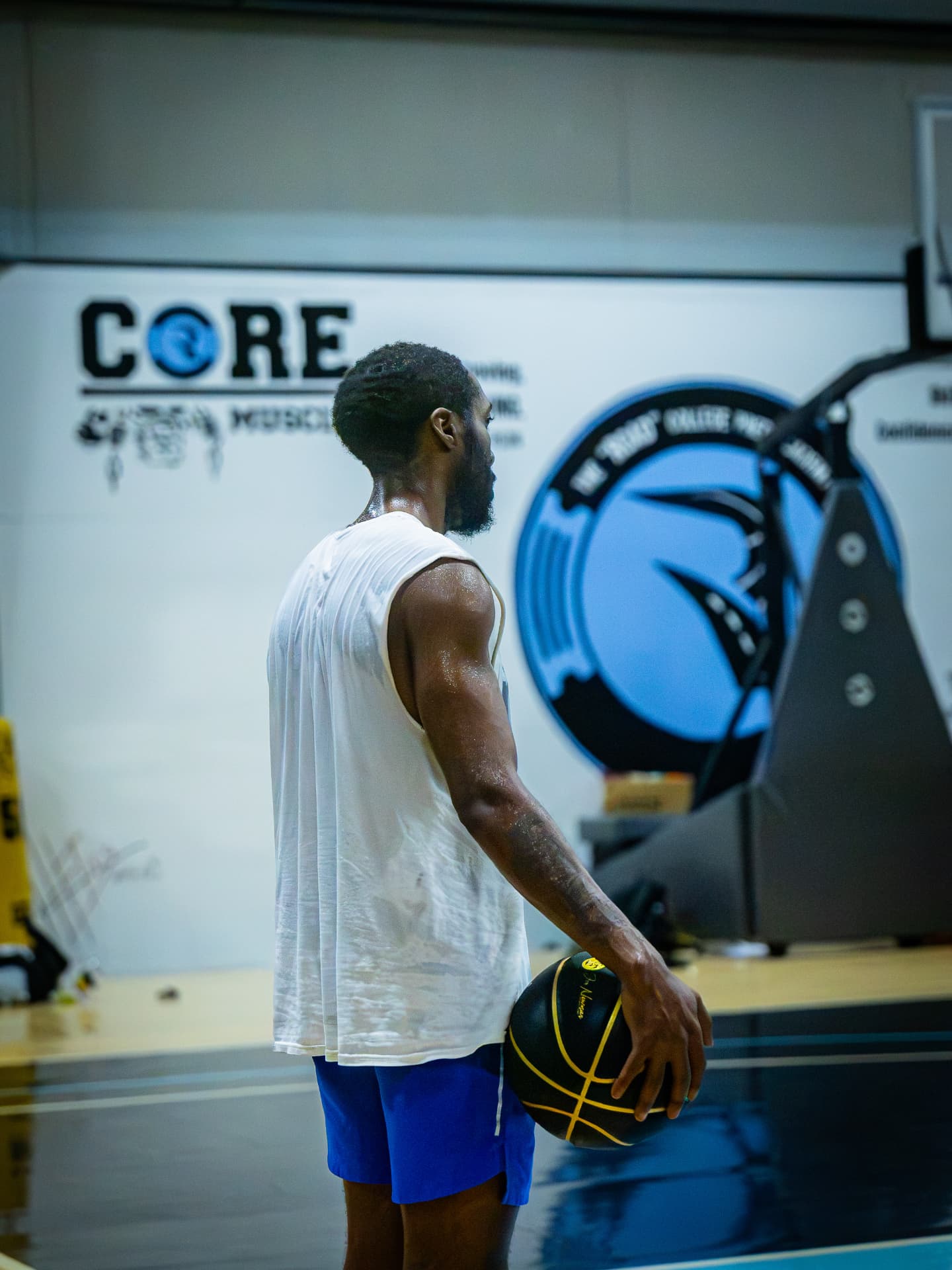 Kings player holding a basketball at the free-throw line