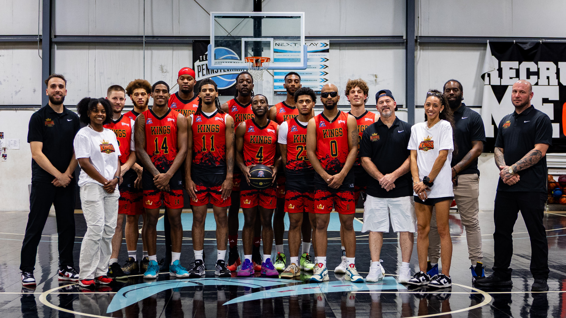 The Central Pennsylvania KINGS team posing together on the court