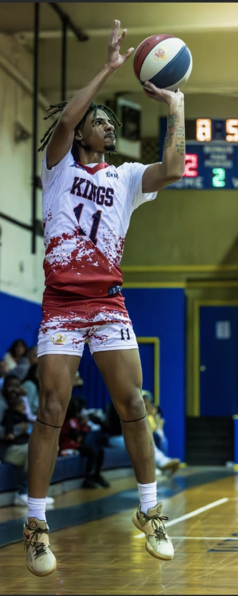 Ka'ron George #11 rising for a jumper